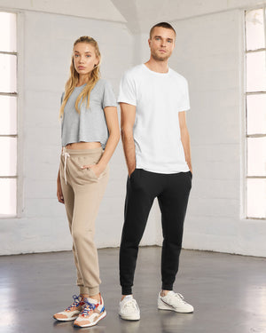 Pictured: woman wearing tan; man wearing black.